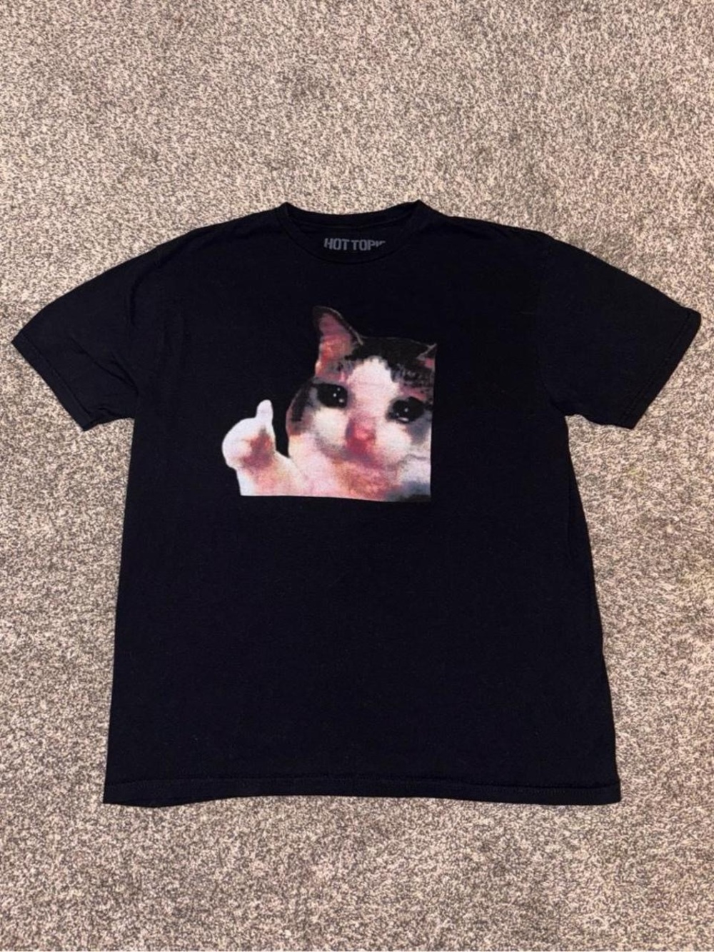 Hot Topic black graphic tee with cat meme